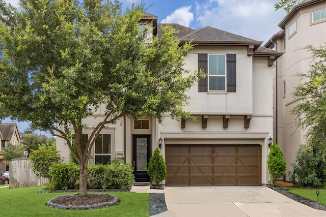 13205 Dartmoor Terrace Dr, Houston, TX 77077 - view of front facade with an attached garage, concrete driveway, a front lawn, and stucco siding