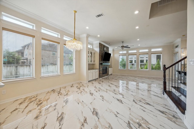 13205 Dartmoor Terrace Dr, Houston, TX 77077 - unfurnished living room with recessed lighting, crown molding, ceiling fan, stairs, and a chandelier