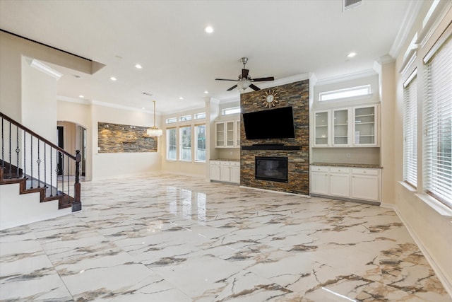 13205 Dartmoor Terrace Dr, Houston, TX 77077 - unfurnished living room featuring ornamental molding, a fireplace, ceiling fan, recessed lighting, and stairs