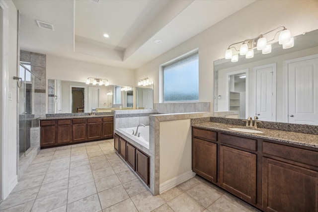 13205 Dartmoor Terrace Dr, Houston, TX 77077 - full bath featuring two vanities, a stall shower, a bath, and tile patterned floors