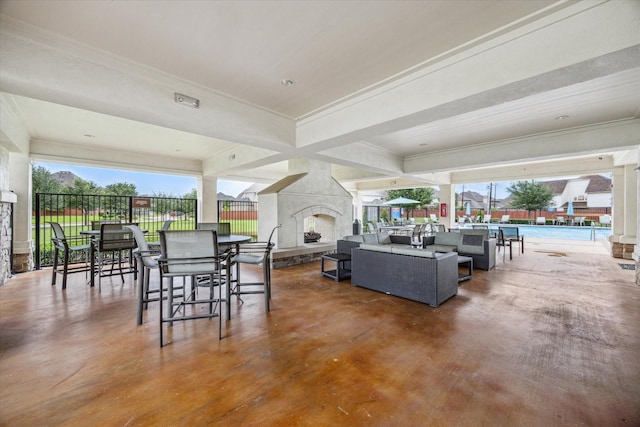 13205 Dartmoor Terrace Dr, Houston, TX 77077 - view of patio / terrace with an outdoor living space with a fireplace