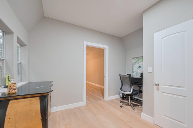 6170 Beech Dr, Montgomery, TX 77316 - home office featuring light wood-style flooring and vaulted ceiling