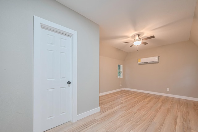 6170 Beech Dr, Montgomery, TX 77316 - spare room with a wall mounted air conditioner, ceiling fan, and light wood finished floors