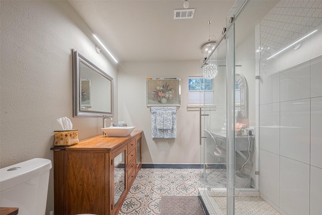 6170 Beech Dr, Montgomery, TX 77316 - full bath featuring vanity, a shower stall, and tile patterned floors