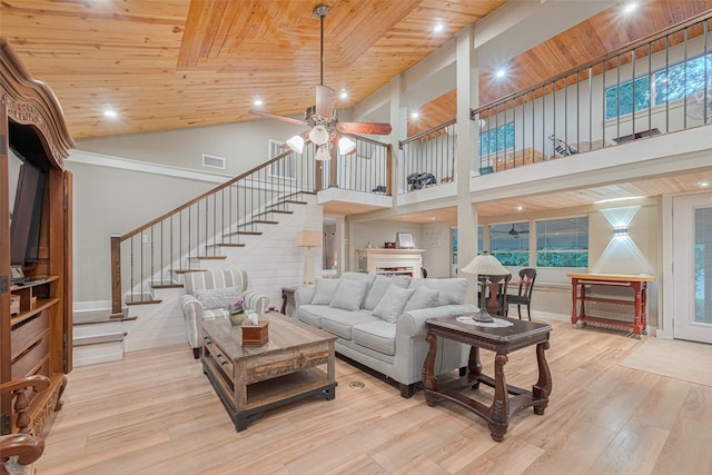 6170 Beech Dr, Montgomery, TX 77316 - living area with high vaulted ceiling, wood ceiling, stairs, wood finished floors, and ceiling fan