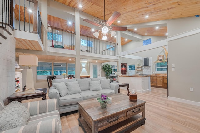 6170 Beech Dr, Montgomery, TX 77316 - living area with a ceiling fan, light wood finished floors, wooden ceiling, recessed lighting, and a high ceiling