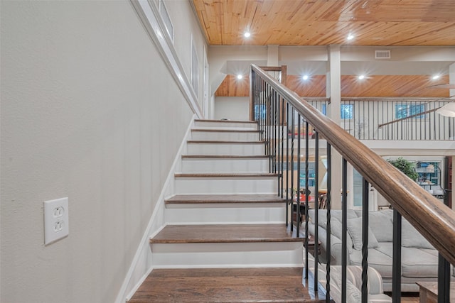 6170 Beech Dr, Montgomery, TX 77316 - staircase with wood ceiling, wood finished floors, and recessed lighting