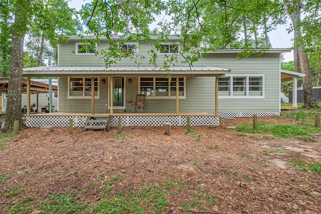 6170 Beech Dr, Montgomery, TX 77316 - rear view of property featuring covered porch