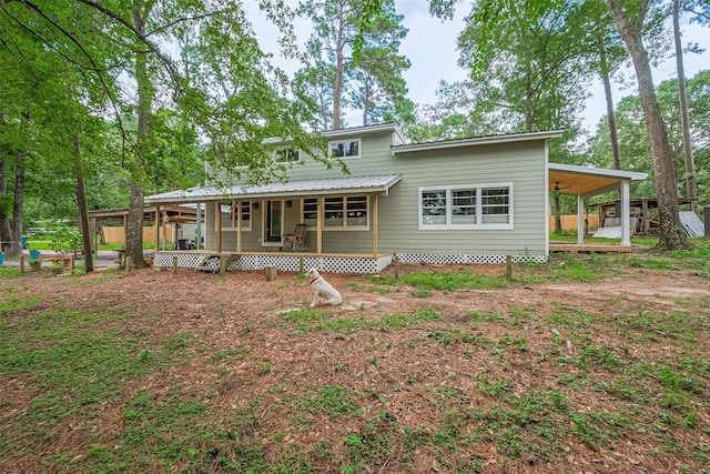 6170 Beech Dr, Montgomery, TX 77316 - back of property with a wooden deck
