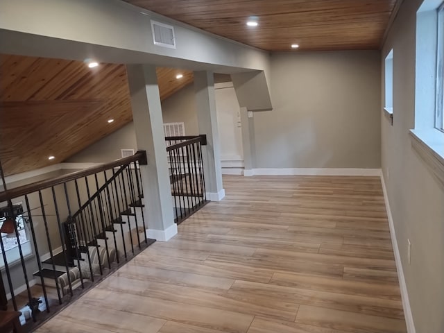 6170 Beech Dr, Montgomery, TX 77316 - corridor with wooden ceiling, wood finished floors, recessed lighting, and an upstairs landing