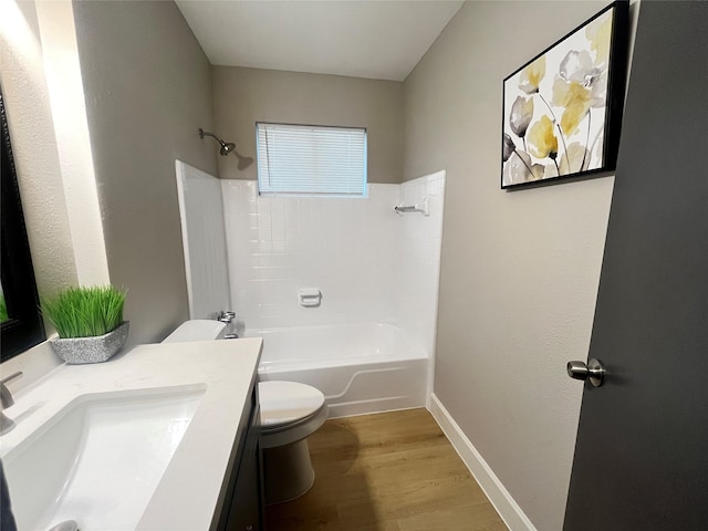 1502 Chilton Ln, Katy, TX 77493 - full bathroom featuring vanity, shower / bathtub combination, and wood finished floors