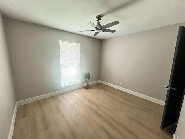1502 Chilton Ln, Katy, TX 77493 - unfurnished room with wood finished floors and ceiling fan