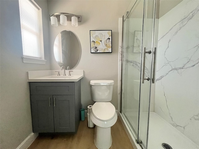 1502 Chilton Ln, Katy, TX 77493 - full bathroom featuring a marble finish shower, vanity, and wood finished floors