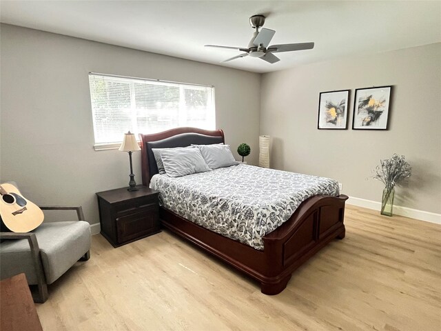 1502 Chilton Ln, Katy, TX 77493 - bedroom featuring light wood-style flooring and a ceiling fan
