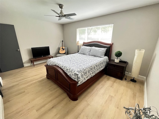 1502 Chilton Ln, Katy, TX 77493 - bedroom featuring light wood finished floors and ceiling fan