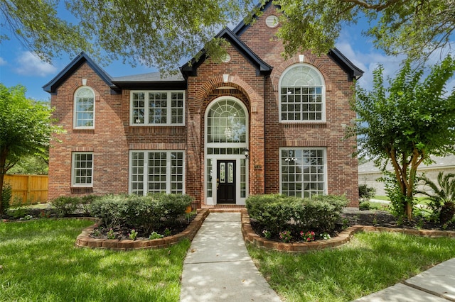 7147 Hot Creek Trce, Humble, TX 77346 - view of front facade featuring brick siding