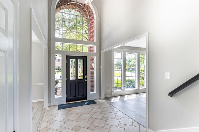 7147 Hot Creek Trce, Humble, TX 77346 - foyer entrance featuring a towering ceiling and baseboards
