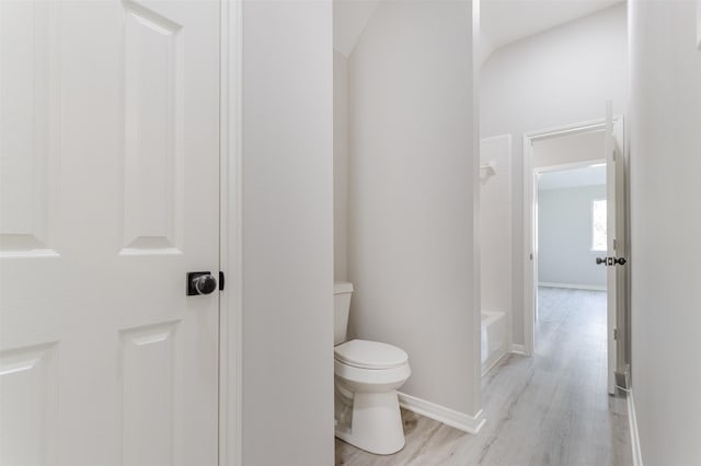 7147 Hot Creek Trce, Humble, TX 77346 - bathroom featuring toilet and wood finished floors