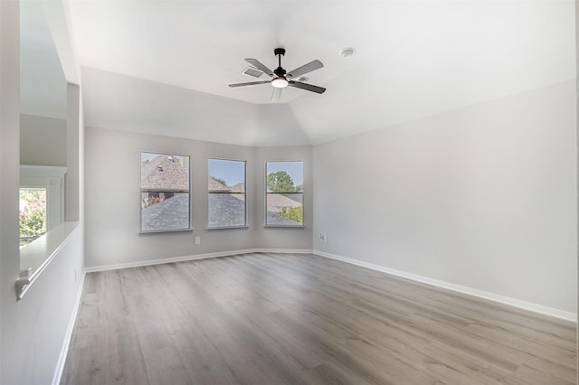 7147 Hot Creek Trce, Humble, TX 77346 - spare room with wood finished floors and ceiling fan