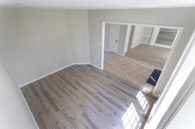 7147 Hot Creek Trce, Humble, TX 77346 - empty room featuring wood finished floors