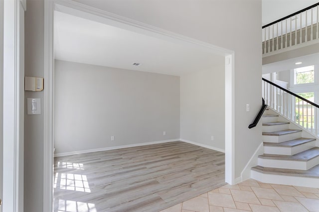 7147 Hot Creek Trce, Humble, TX 77346 - stairs with baseboards