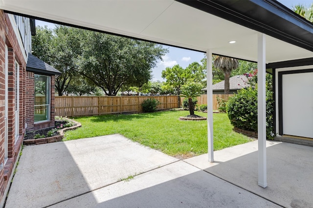 7147 Hot Creek Trce, Humble, TX 77346 - fenced backyard with a patio area