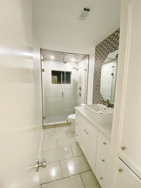 11319 Lockgate Ln, Houston, TX 77048 - full bathroom featuring tile patterned floors, a shower stall, and vanity