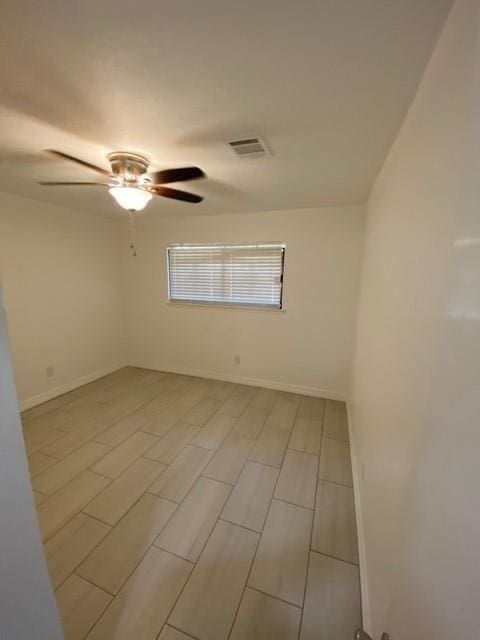 11319 Lockgate Ln, Houston, TX 77048 - empty room with ceiling fan and baseboards