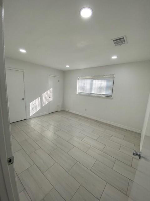 11319 Lockgate Ln, Houston, TX 77048 - spare room with recessed lighting and baseboards