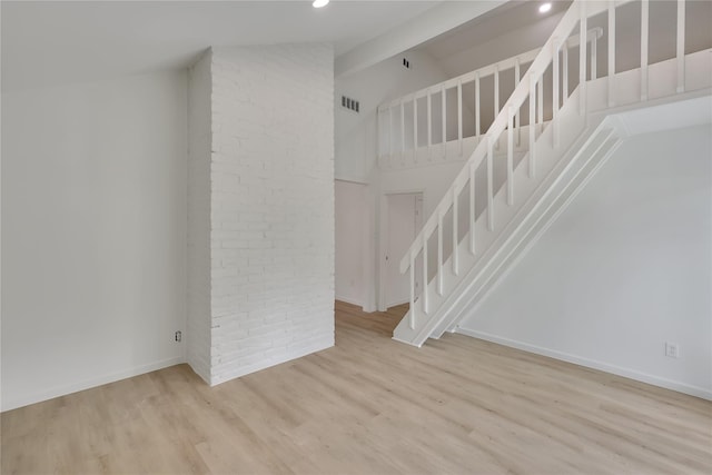 1503 Bamwick Dr, Houston, TX 77090 - unfurnished living room with wood finished floors, recessed lighting, and high vaulted ceiling
