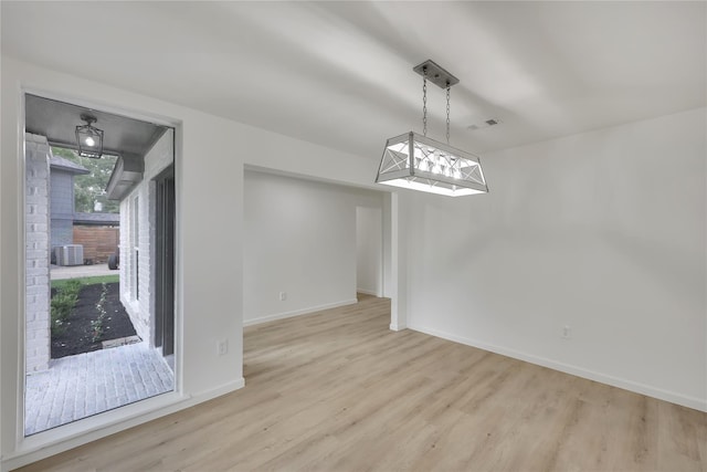 1503 Bamwick Dr, Houston, TX 77090 - unfurnished dining area with wood finished floors and baseboards