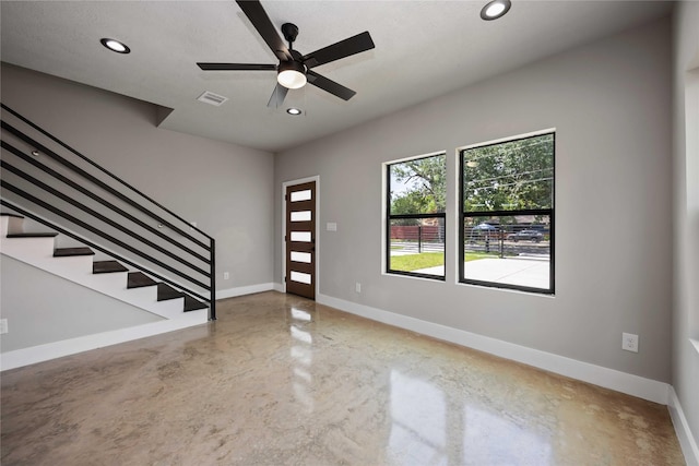 2407 Dolly Wright St, Houston, TX 77088 - entrance foyer featuring recessed lighting, stairs, a ceiling fan, and concrete floors
