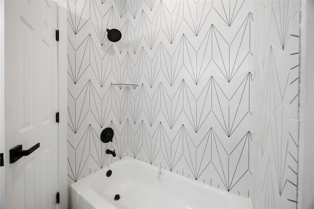 2407 Dolly Wright St, Houston, TX 77088 - bathroom featuring tile walls and shower / washtub combination