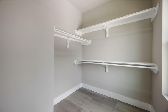 2407 Dolly Wright St, Houston, TX 77088 - walk in closet with wood finished floors