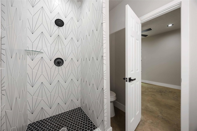 2407 Dolly Wright St, Houston, TX 77088 - bathroom with tiled shower, concrete floors, and recessed lighting