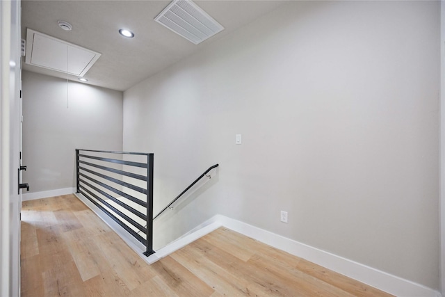 2409 Dolly Wright St, Houston, TX 77088 - staircase with attic access, wood finished floors, and recessed lighting