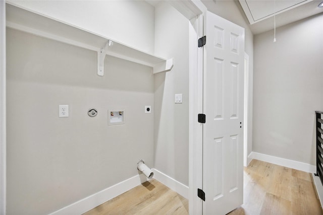 2409 Dolly Wright St, Houston, TX 77088 - laundry area with attic access, light wood-type flooring, hookup for an electric dryer, and washer hookup