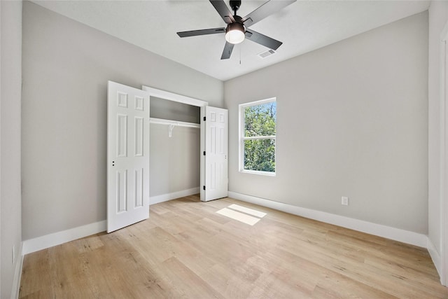 2409 Dolly Wright St, Houston, TX 77088 - unfurnished bedroom with light wood-style flooring, a closet, and ceiling fan