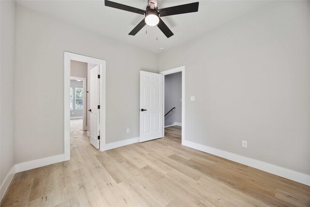 2409 Dolly Wright St, Houston, TX 77088 - unfurnished bedroom with light wood-style floors and ceiling fan