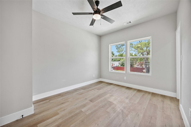2409 Dolly Wright St, Houston, TX 77088 - spare room featuring light wood finished floors and a ceiling fan