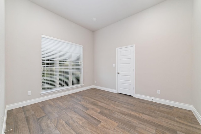 13727 Pedernales Ct, Cypress, TX 77429 - spare room featuring wood finished floors and baseboards