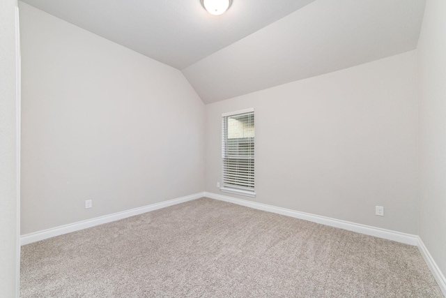 13727 Pedernales Ct, Cypress, TX 77429 - unfurnished room featuring light carpet and lofted ceiling