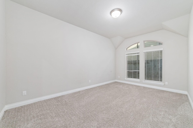 13727 Pedernales Ct, Cypress, TX 77429 - carpeted empty room with lofted ceiling and baseboards