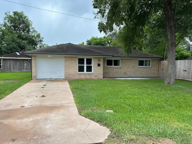 318 N 4th St, Alvin, TX 77511 - ranch-style house featuring driveway, brick siding, and a garage