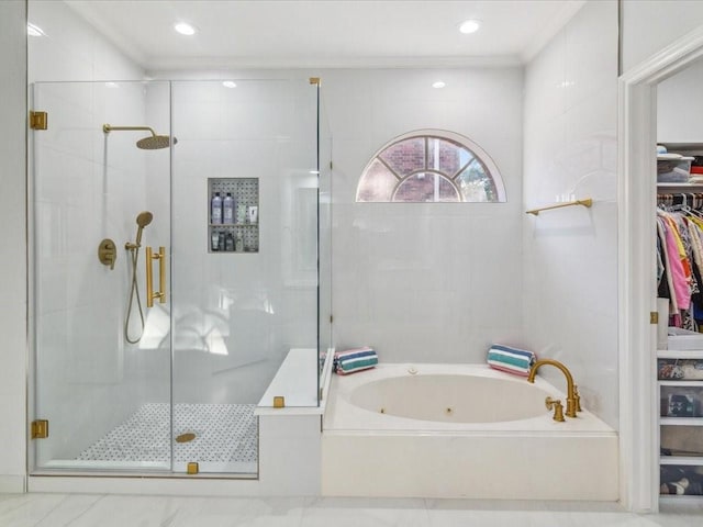 4614 Jamaica Dr, Sugar Land, TX 77479 - bathroom with a stall shower, a jetted tub, a spacious closet, and crown molding