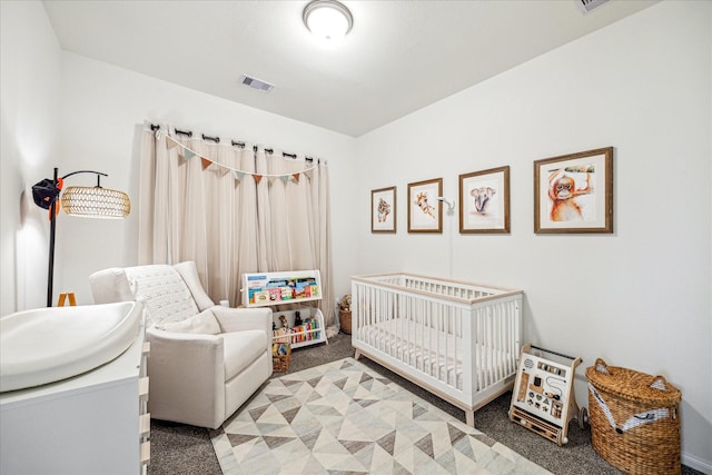 32311 Noble Creek Dr, Conroe, TX 77385 - bedroom featuring a crib and light carpet