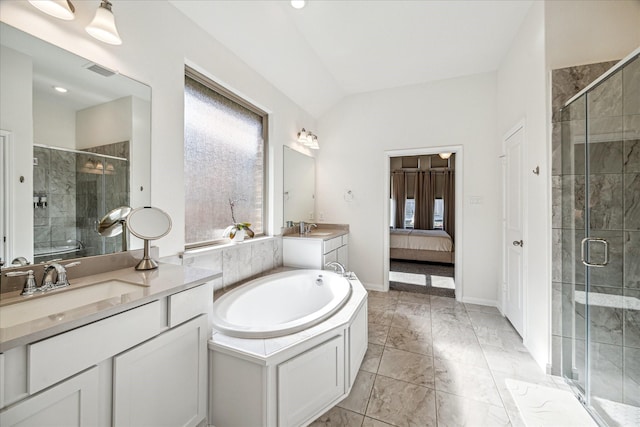 32311 Noble Creek Dr, Conroe, TX 77385 - ensuite bathroom with healthy amount of natural light, a bath, vanity, a stall shower, and lofted ceiling