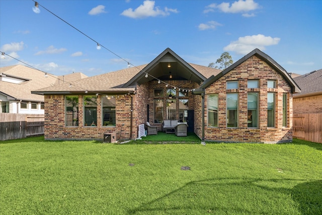 32311 Noble Creek Dr, Conroe, TX 77385 - back of property featuring brick siding, a fenced backyard, and a shingled roof