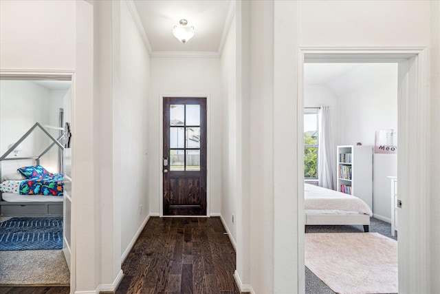 32311 Noble Creek Dr, Conroe, TX 77385 - foyer entrance featuring dark wood-style floors and ornamental molding