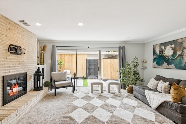 6429 Burgoyne Rd Unit 15, Houston, TX 77057 - carpeted living room featuring ornamental molding, a brick fireplace, and recessed lighting